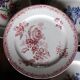 A set of 4 flat plates in pink and blue with Fontanges flowers from Sarreguemines.