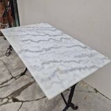Antique marble and cast iron bistro restaurant table