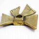 Brass bow tie candle holder 1970
