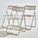 Chaise pliante en métal blanc