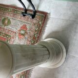 White marble column – sculpted base