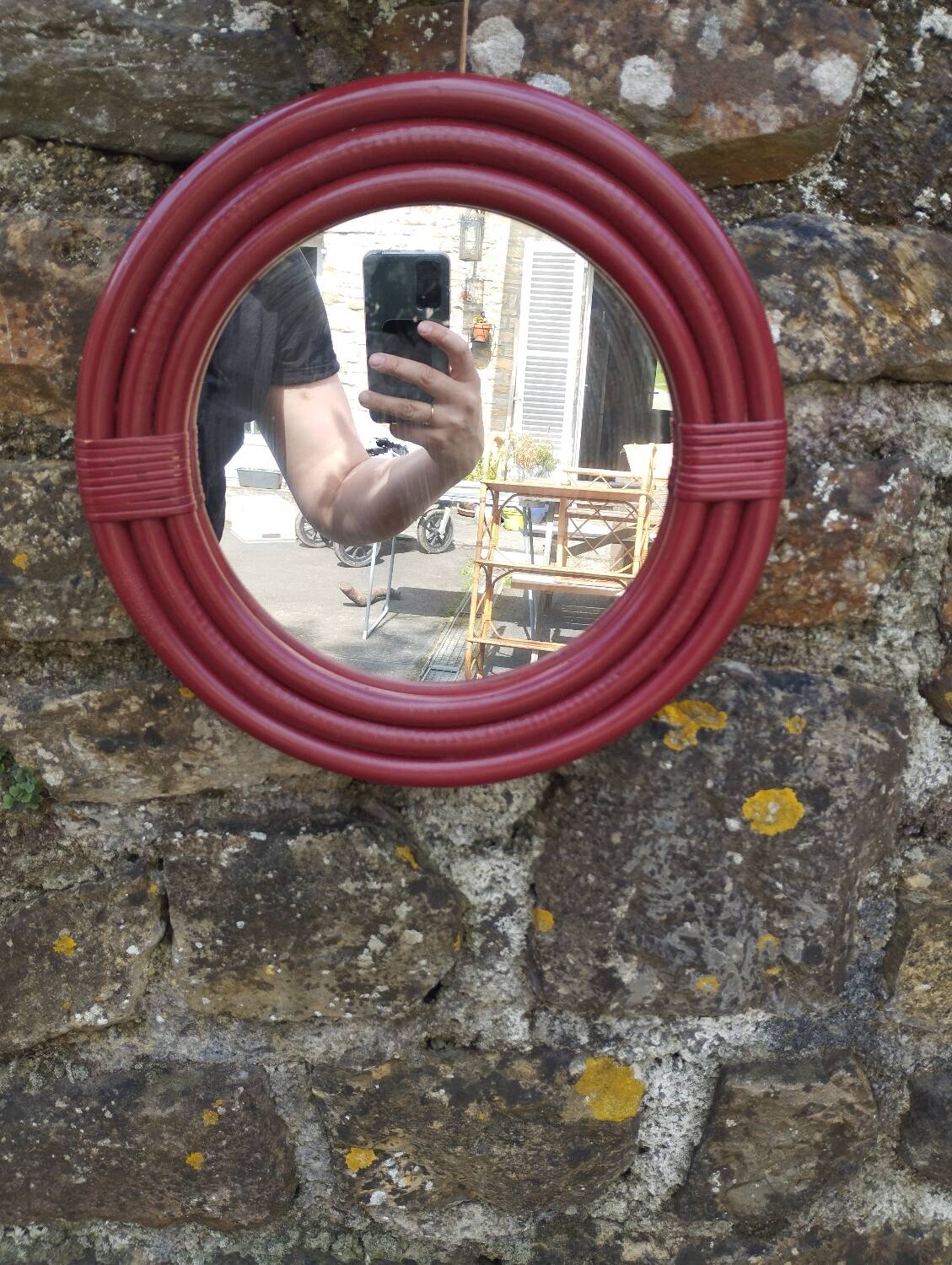 Burgundy rattan mirror