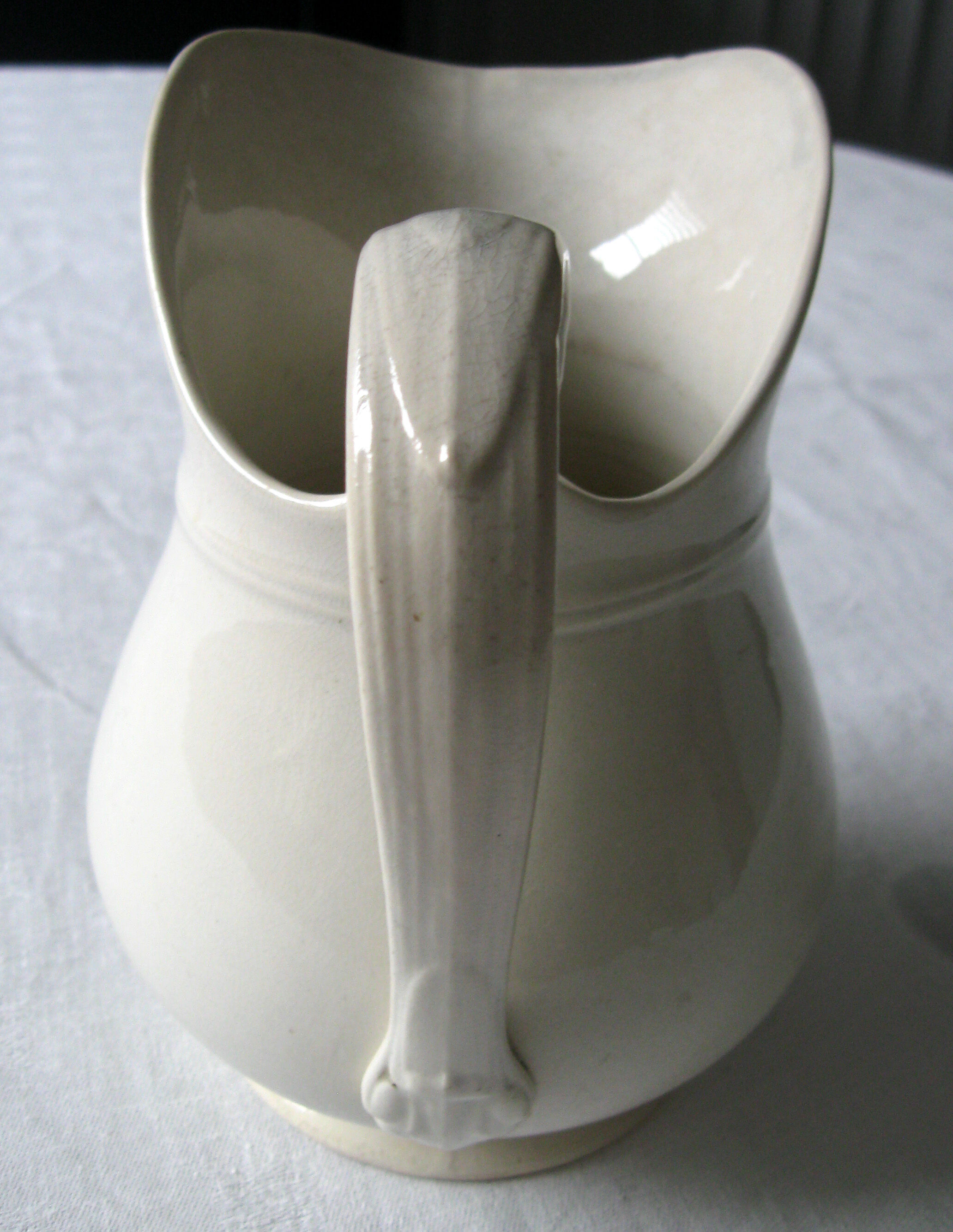 Old toilet bro in white earthenware