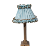Brass lamp with vintage blue laminated lampshade