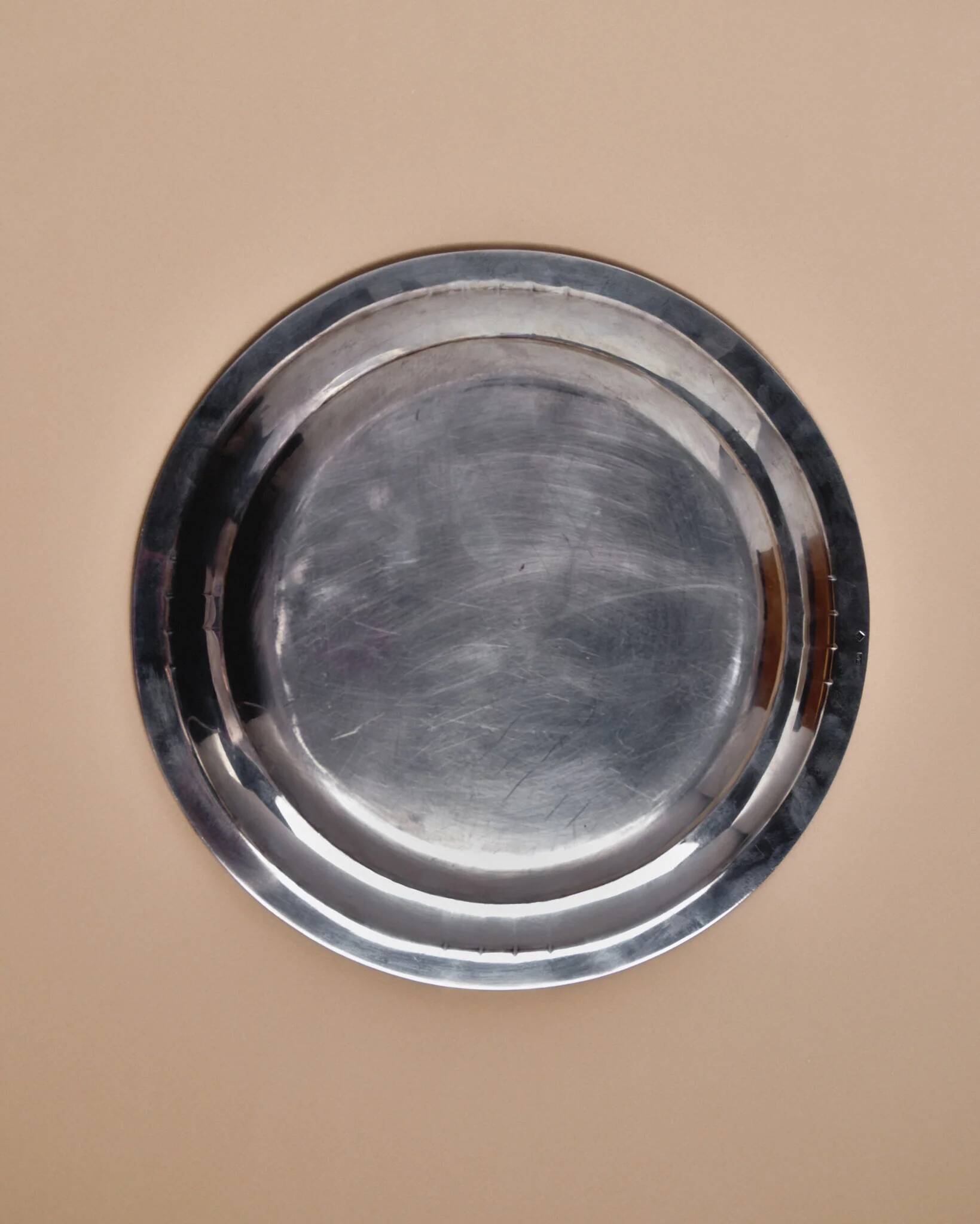 Round silver-plated metal dish, Samuel Askenfeld