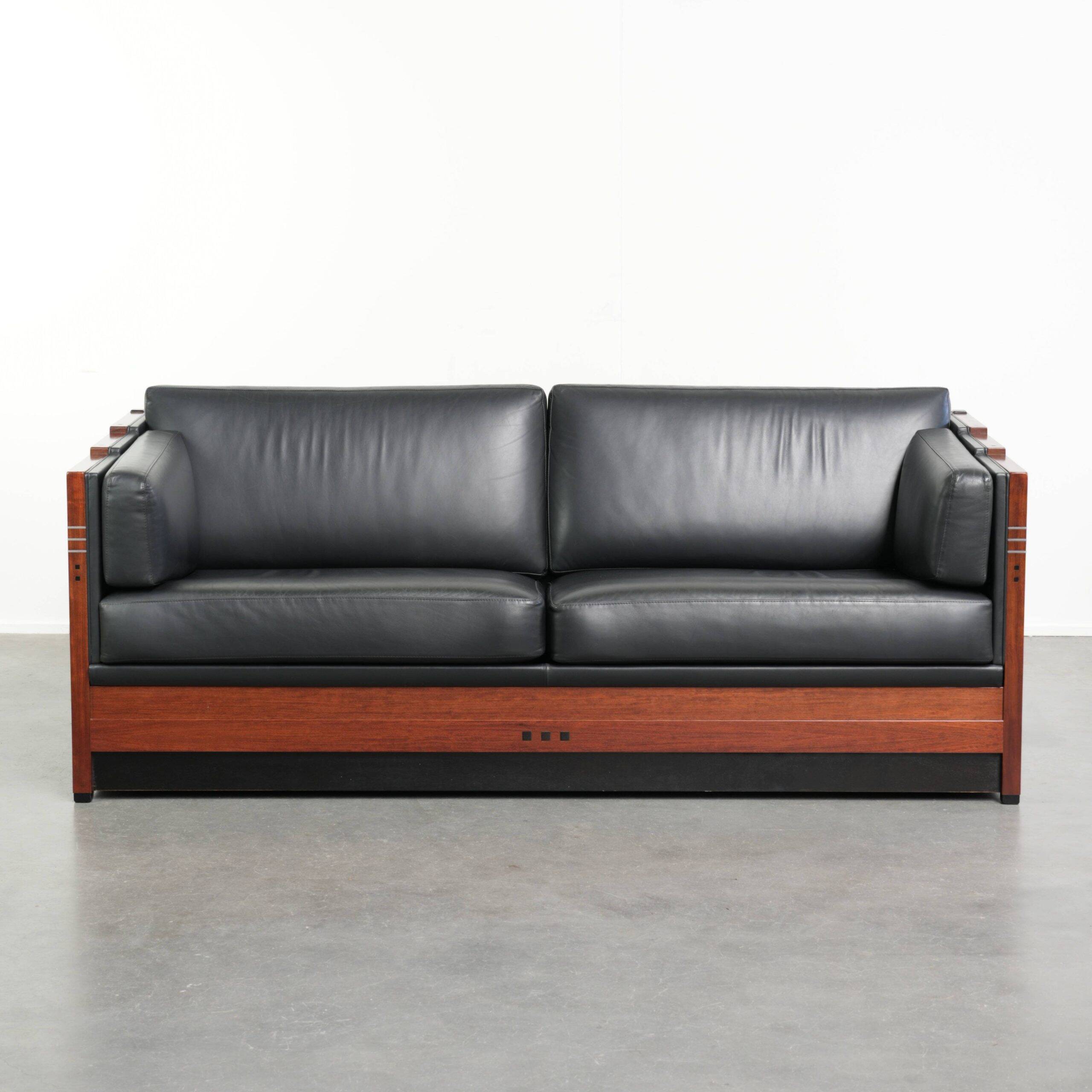 3-seater black cow leather sofa in timeless Art Deco design