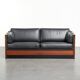 3-seater black cow leather sofa in timeless Art Deco design
