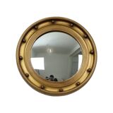 Grand miroir de majordome ancien avec cadre doré et hublot en forme d'œil de sorcière, années 1930