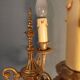 Electrified three-spoke brass candlesticks