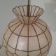 Mother-of-pearl and brass suspension