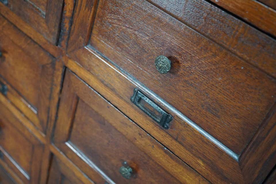 1870s oak apothecary cabinet