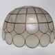 Mother-of-pearl and brass suspension
