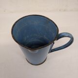 Old blue enamelled pitcher with spout