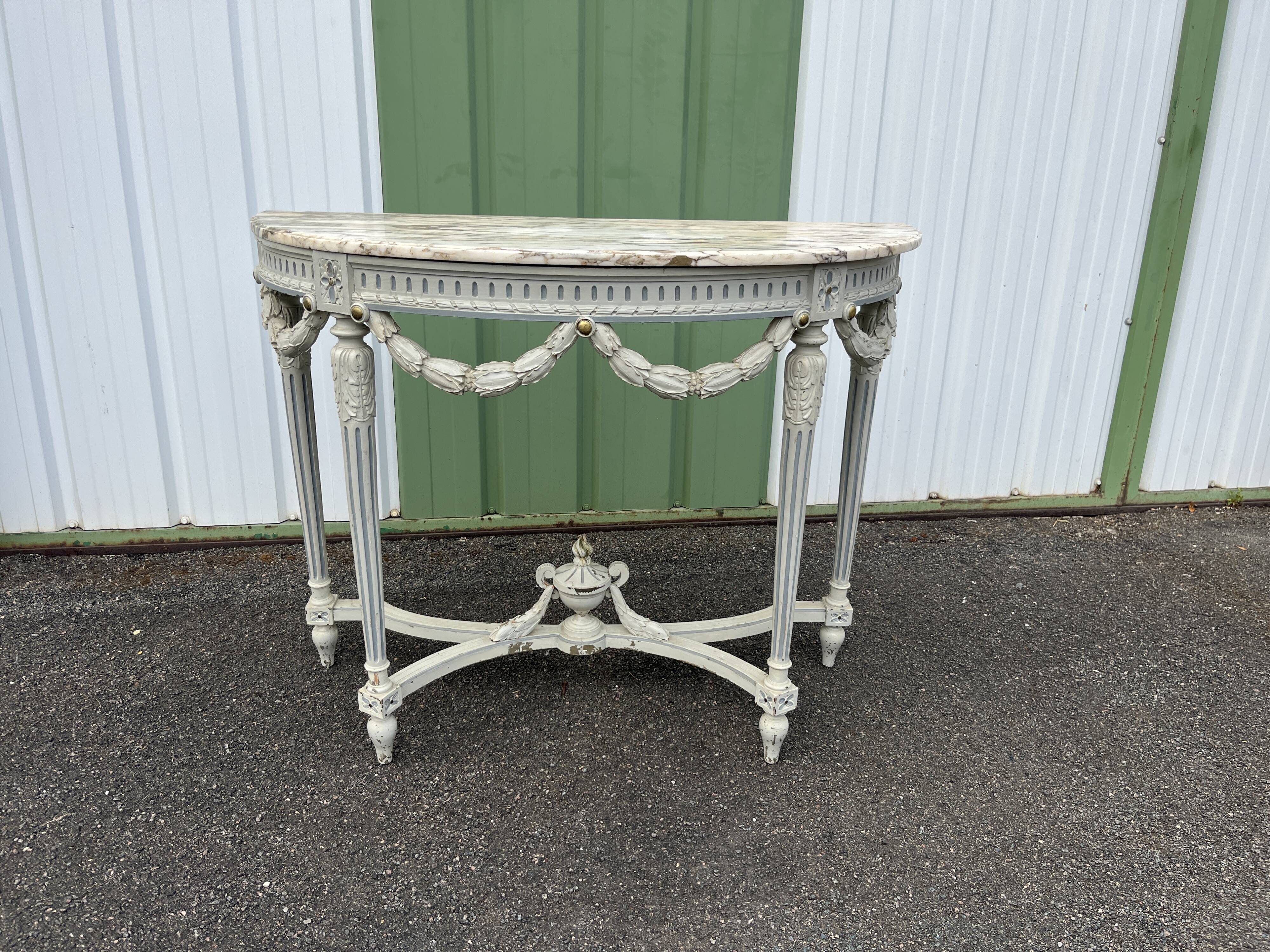 Louis XVI style half-moon console table with carved and painted wood and marble top
