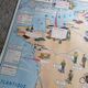 Vintage school map of France "Commerce and Clothing"