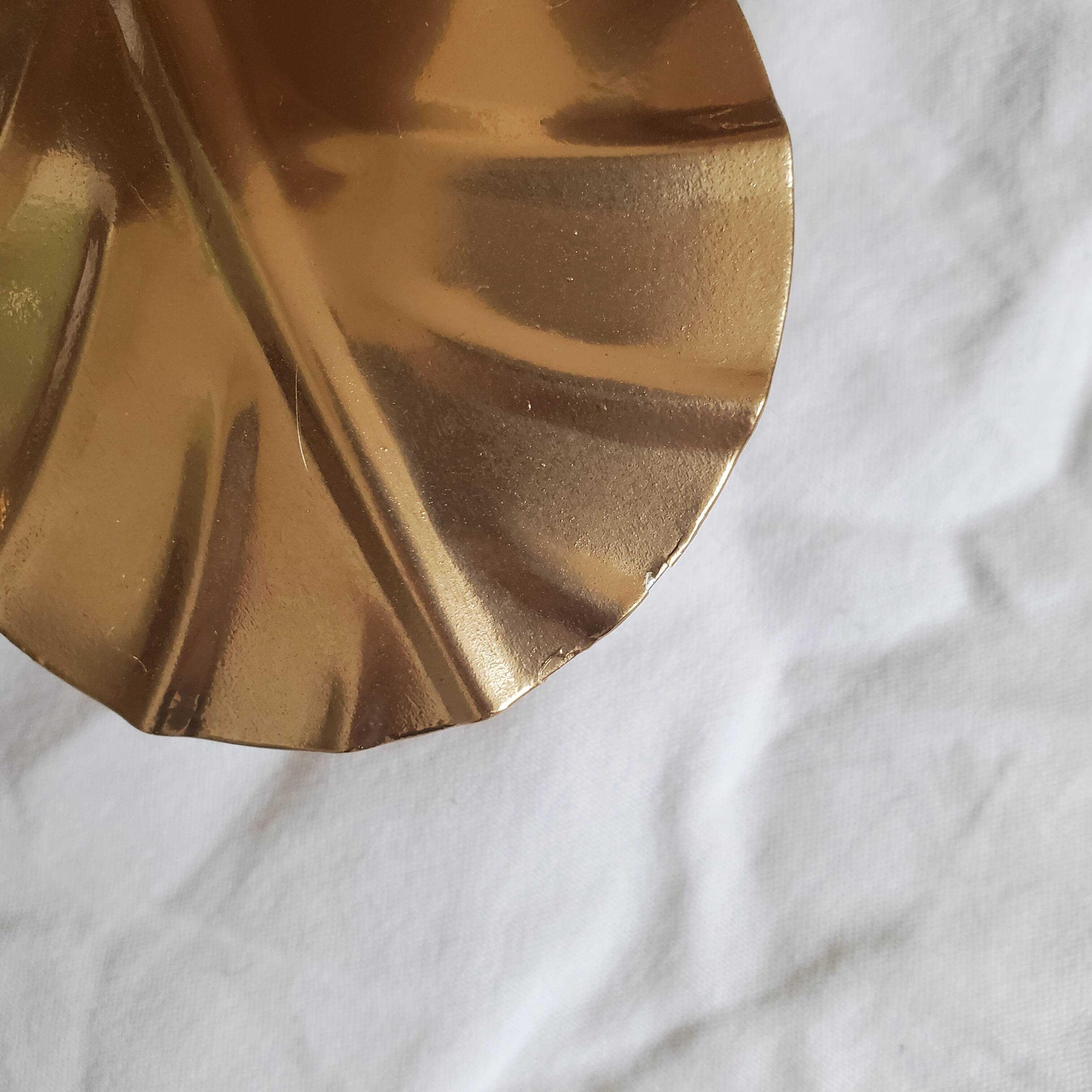 Golden metal flower sconces