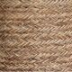 Hand-woven laundry basket in natural rush
