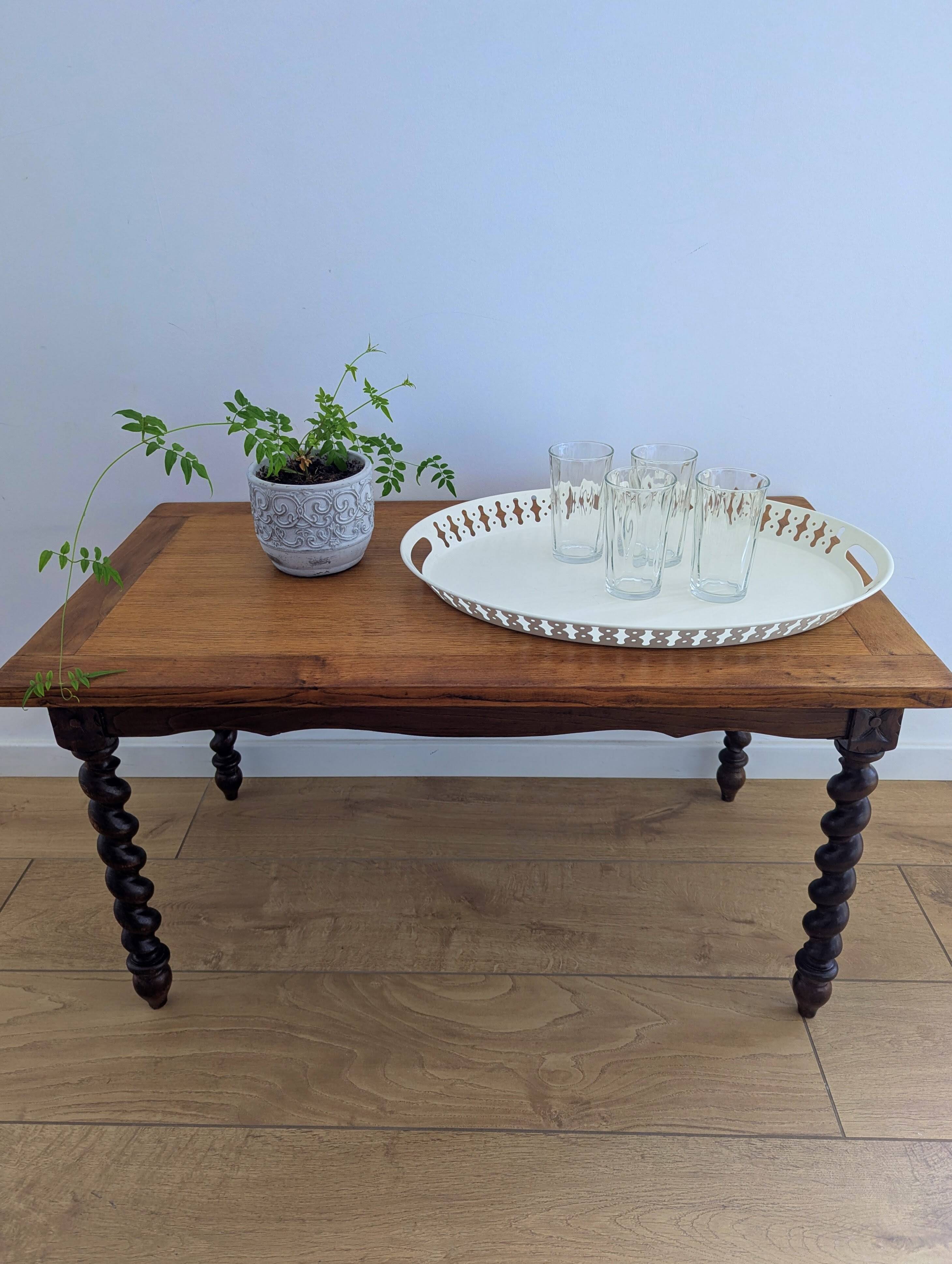 Solid wood coffee table with carved twisted legs