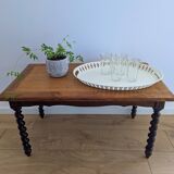 Solid wood coffee table with carved twisted legs