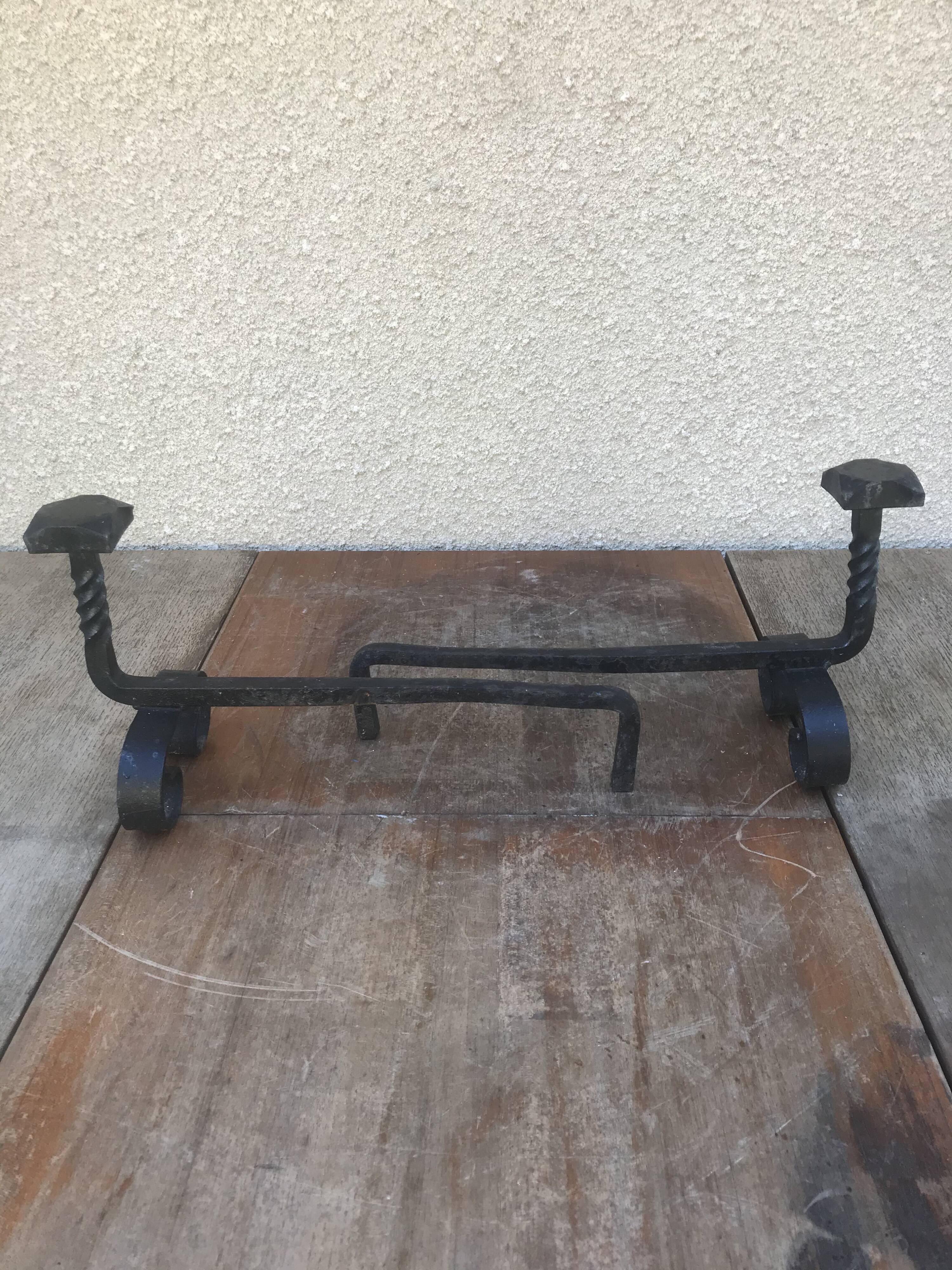 Old pair of twisted wrought iron andirons