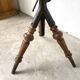 Tripod workshop stool in turned wood and cast iron — circa 1900