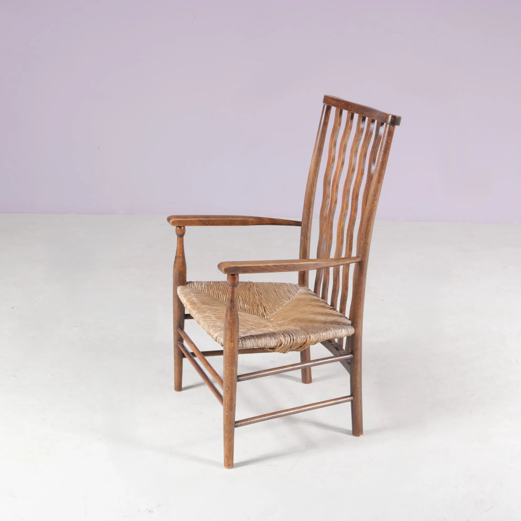 1930s small low spindle-back hearth chair / side chair with wicker seat, Arts & Craft Movement, Morris & Co for Liberty and Co, Stowaway London