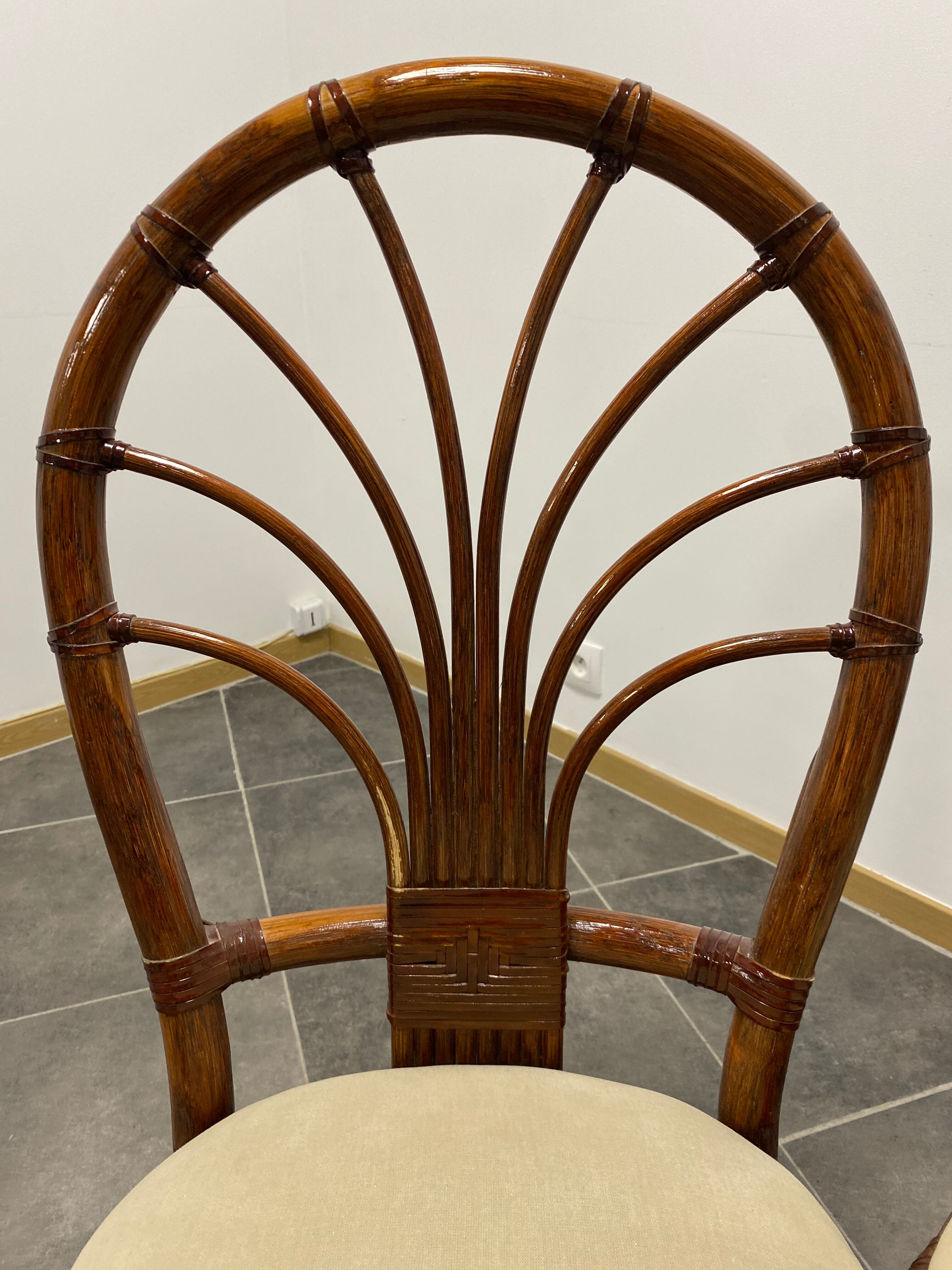 4 vintage woven rattan chairs