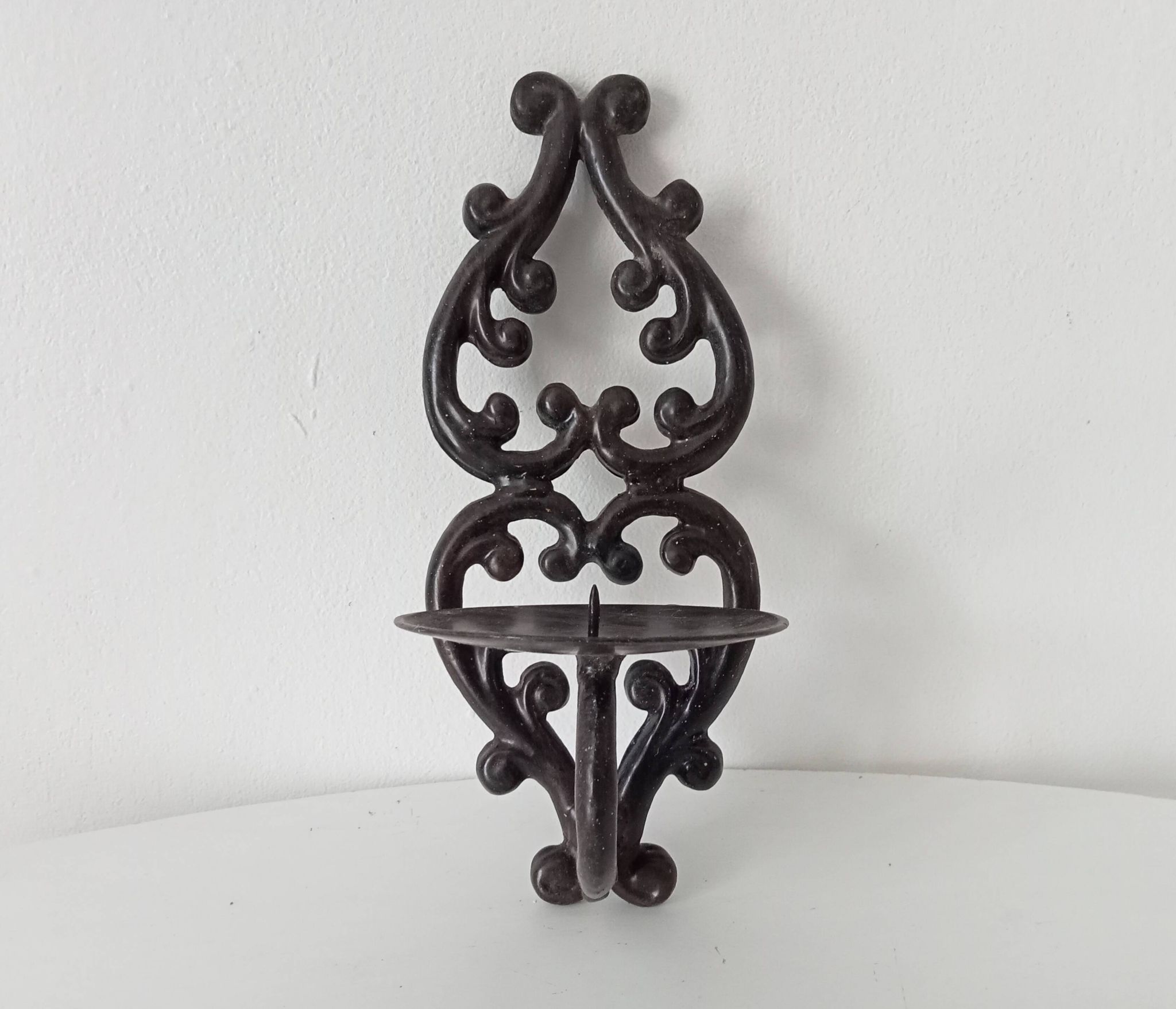 Antique wall candle holder in enamelled cast iron