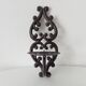 Antique wall candle holder in enamelled cast iron