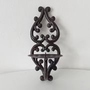 Antique wall candle holder in enamelled cast iron