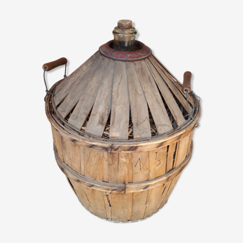 Demijohn dressed in authentic wood