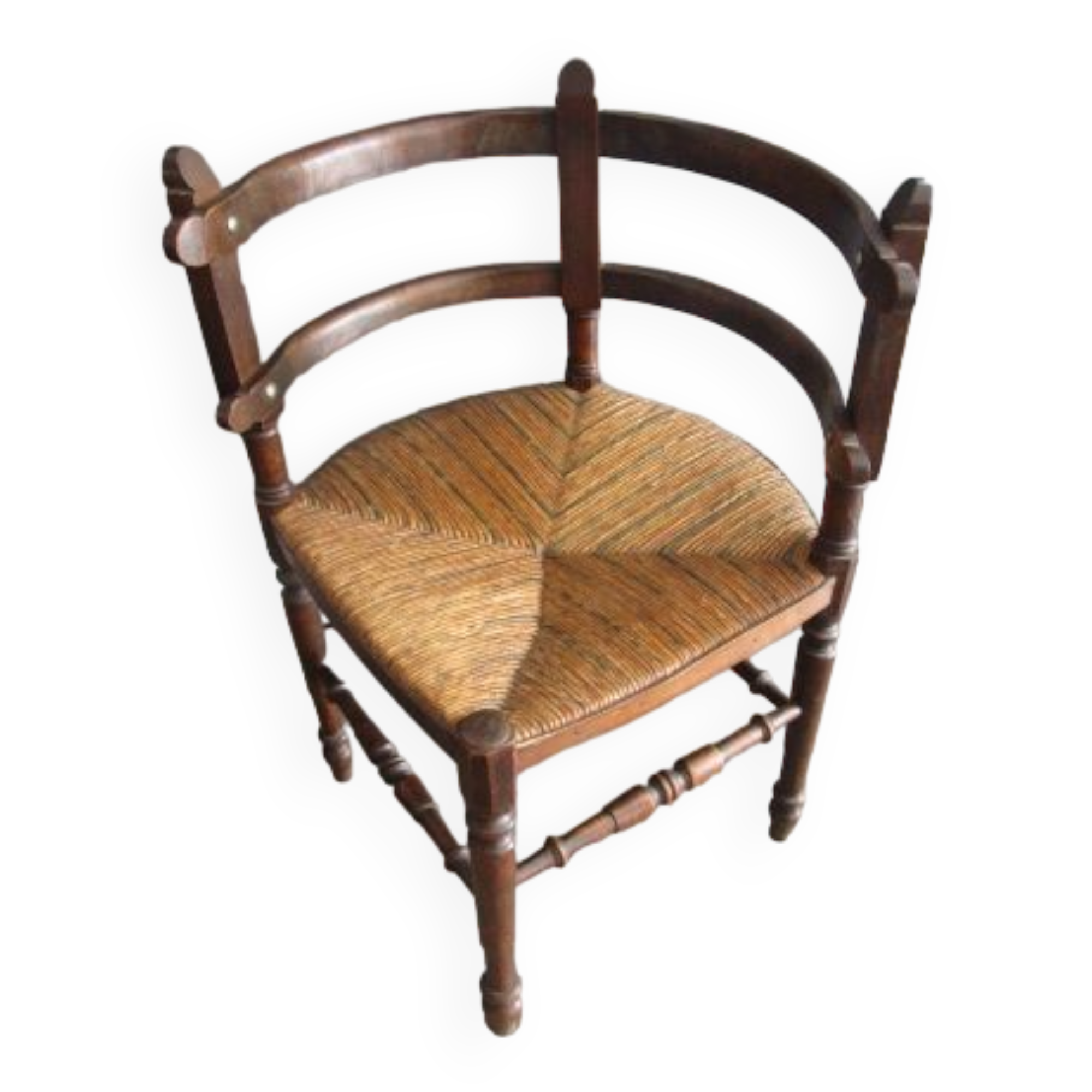 Old straw corner armchair