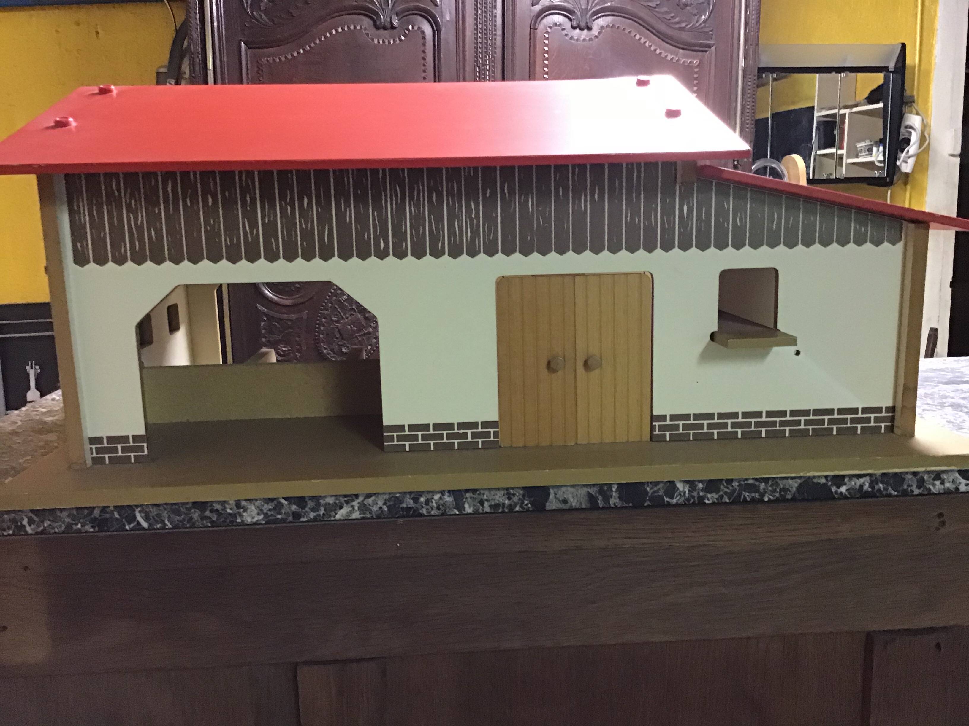Wooden farm for children with animals.