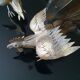 Duo of gold metal roosters 1950
