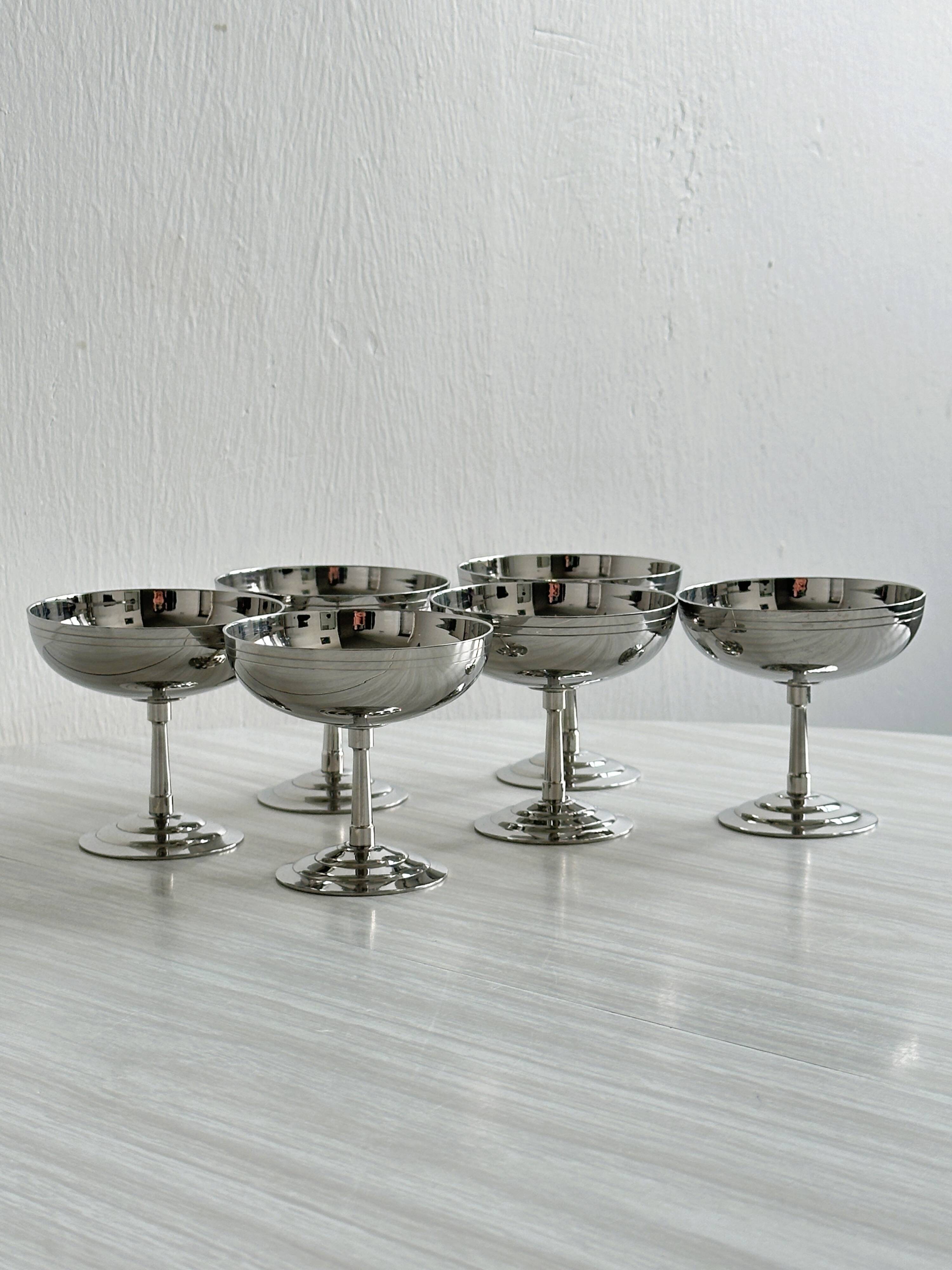 6 stainless steel standing cups, Letang Remy, France.