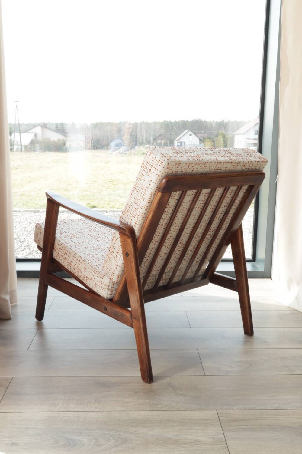 Vintage Danish boucle armchair with orange polka dots from the 1960s.