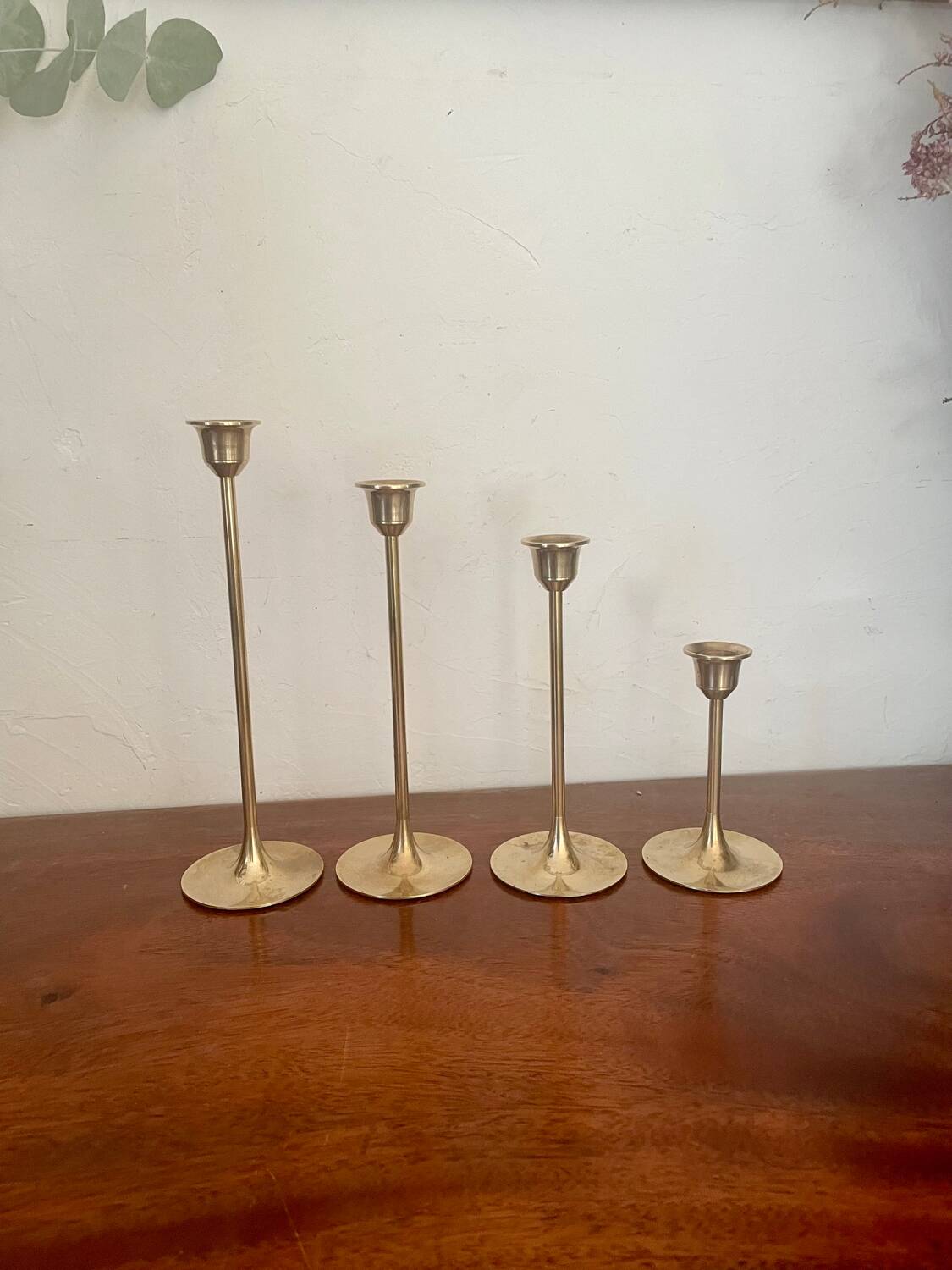 Set of 4 Scandinavian brass candlesticks