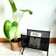 Cast iron magazine rack, circa 1950