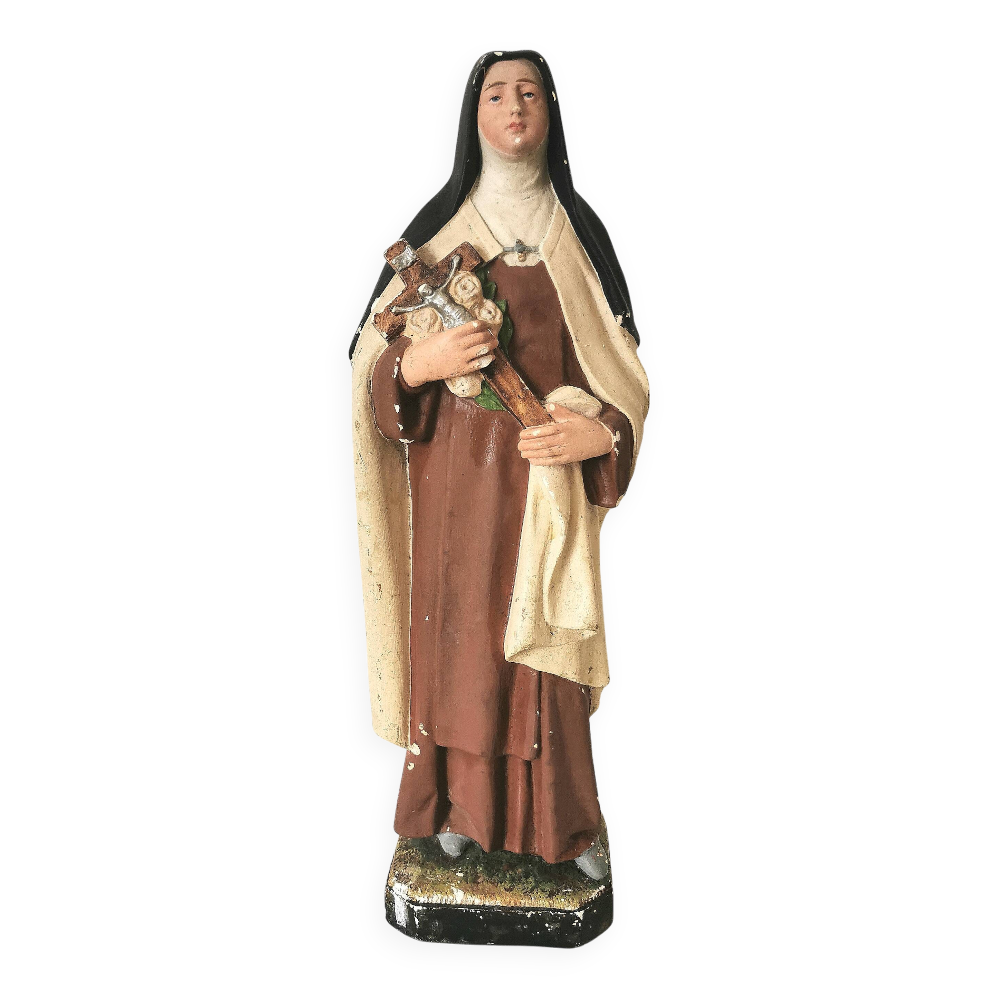 religious statue of Saint Therese of Lisieux in painted plaster