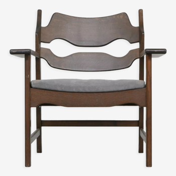 Oak razor mid-century danish armchair by Henning Kjaernulf