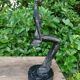 Sculpture of a dancer on a swing signed by Raphaël