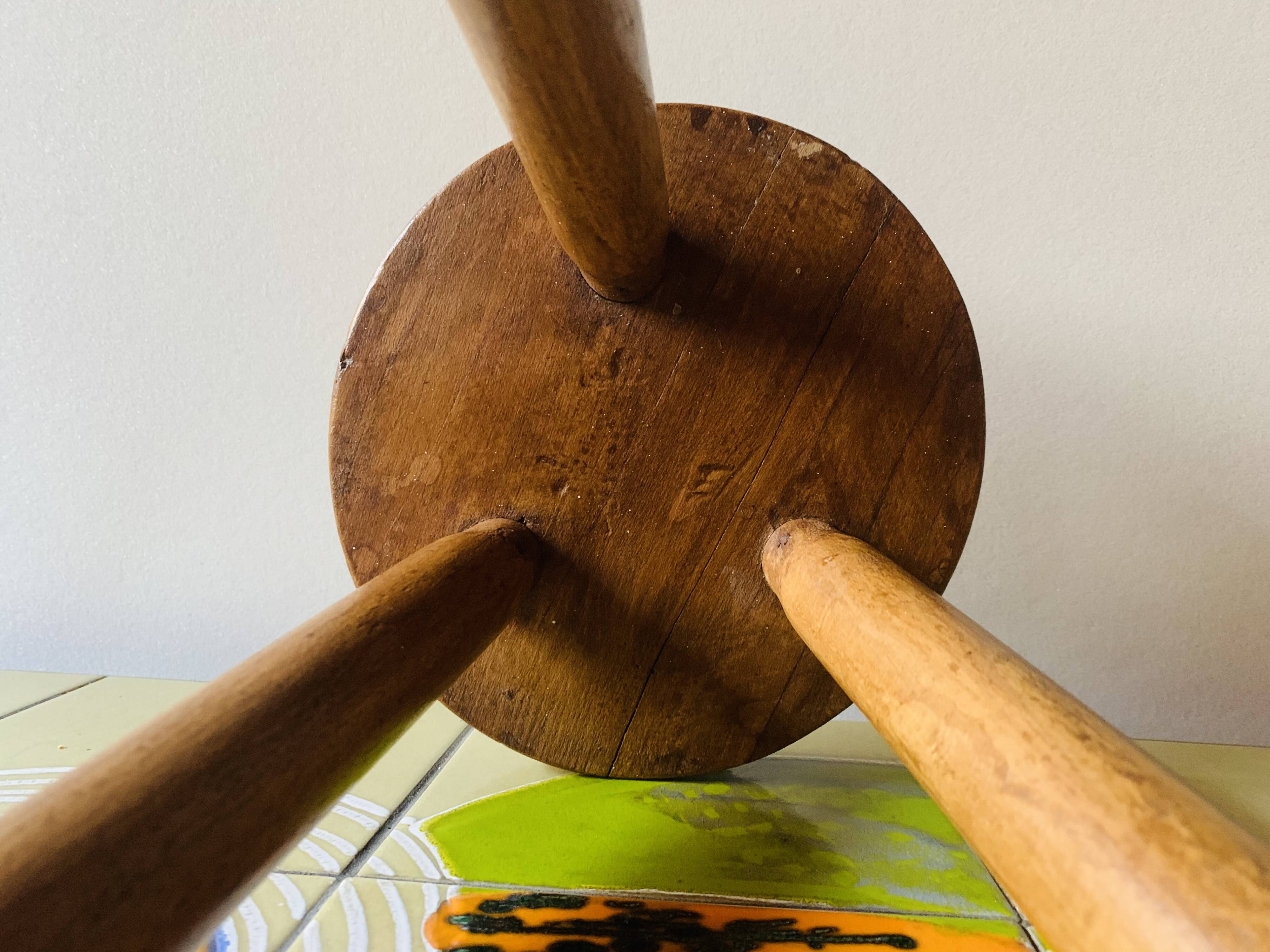 Small tripod stool in solid wood