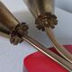 Vintage 1950s wall lamp in brass with flower decoration.