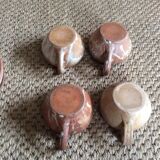 Series of 4 stoneware coffee cups