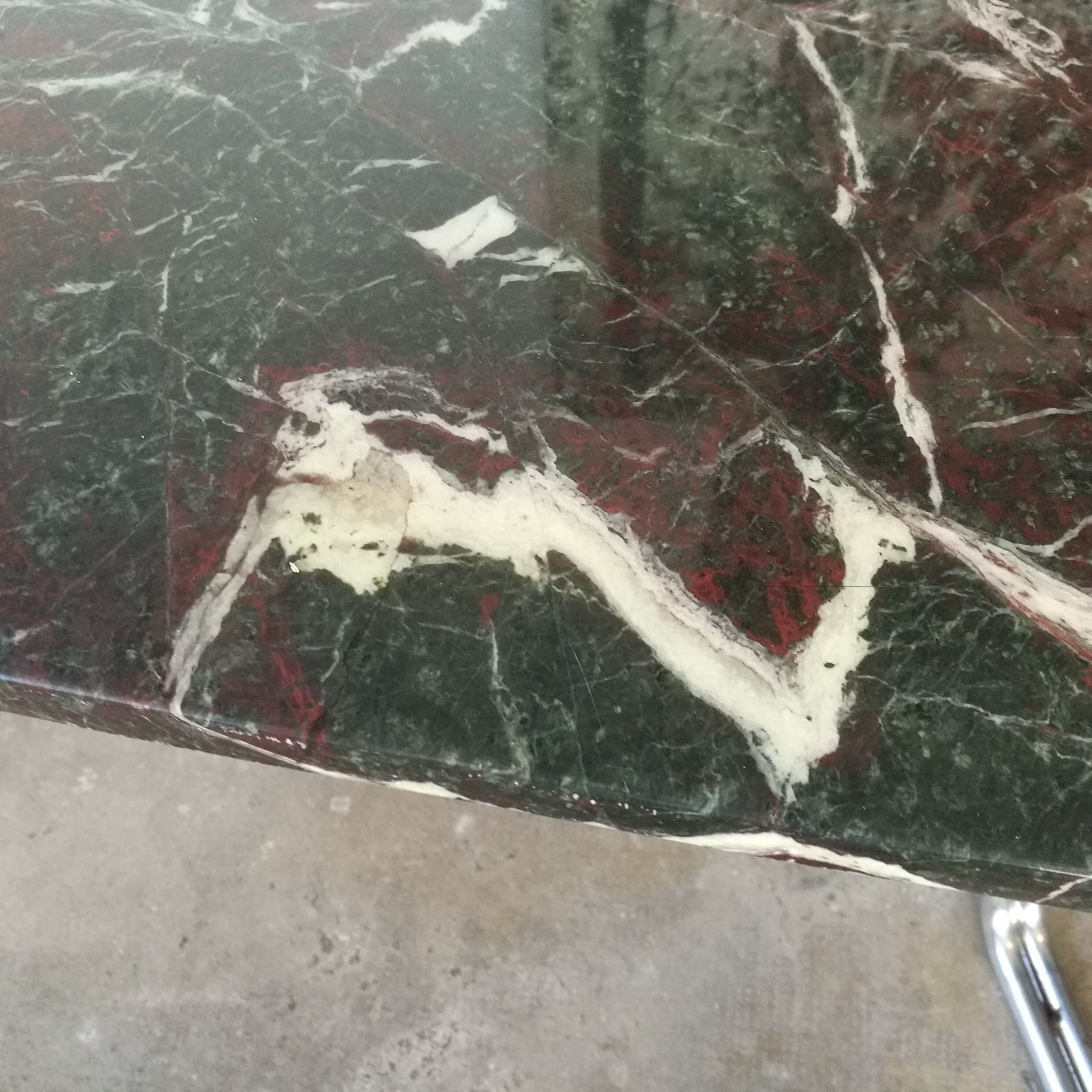 Table, chrome foot, red marble