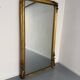 Large Napoleon III mirror with wooden gilded frame, 19th century, 200 cm.