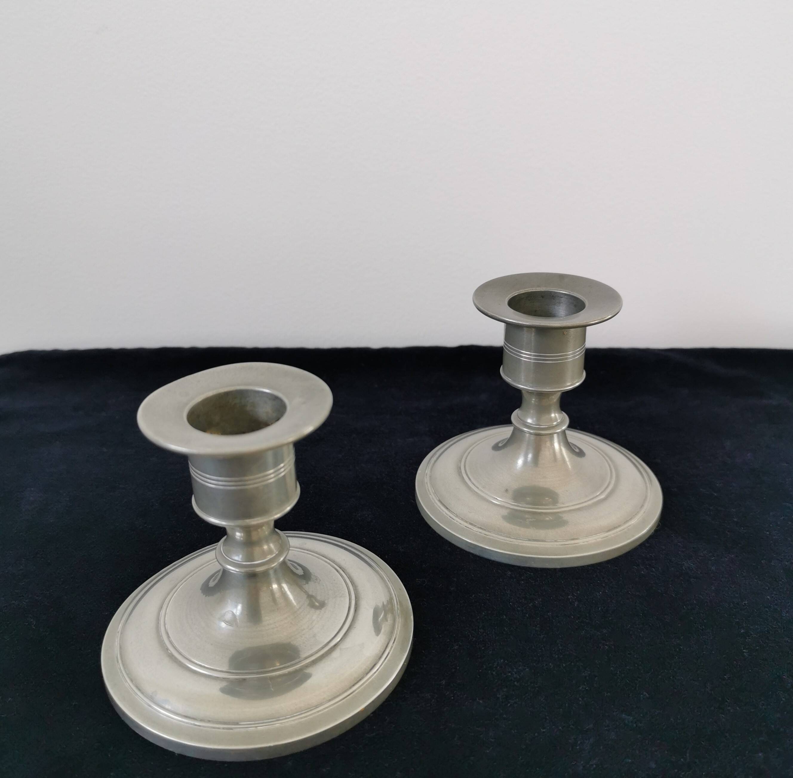 Pair of pewter candlesticks