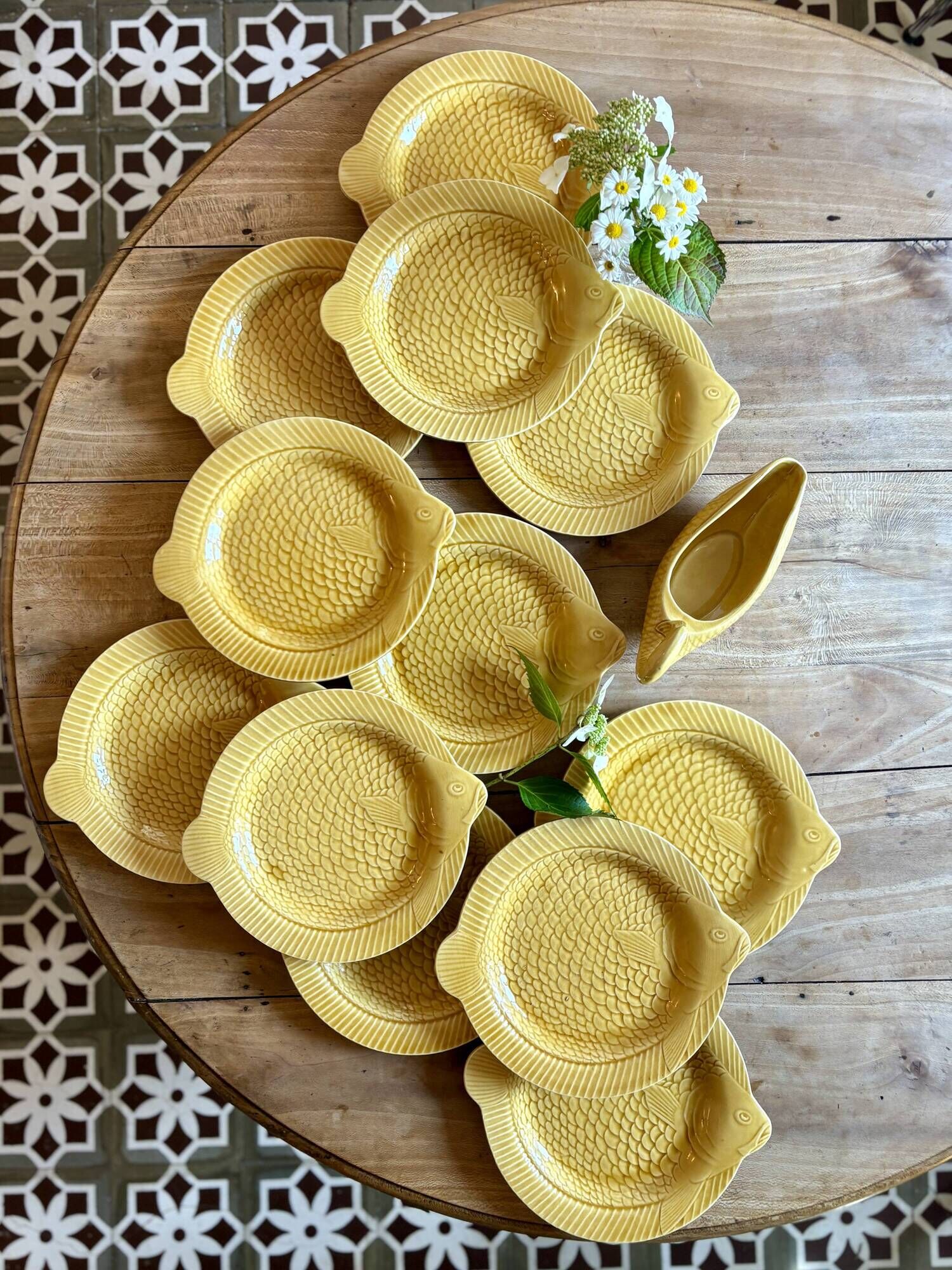 Set of 11 vintage Sarreguemines fish plates and sauceboat