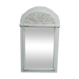 White and gold patinated sculpted mirror