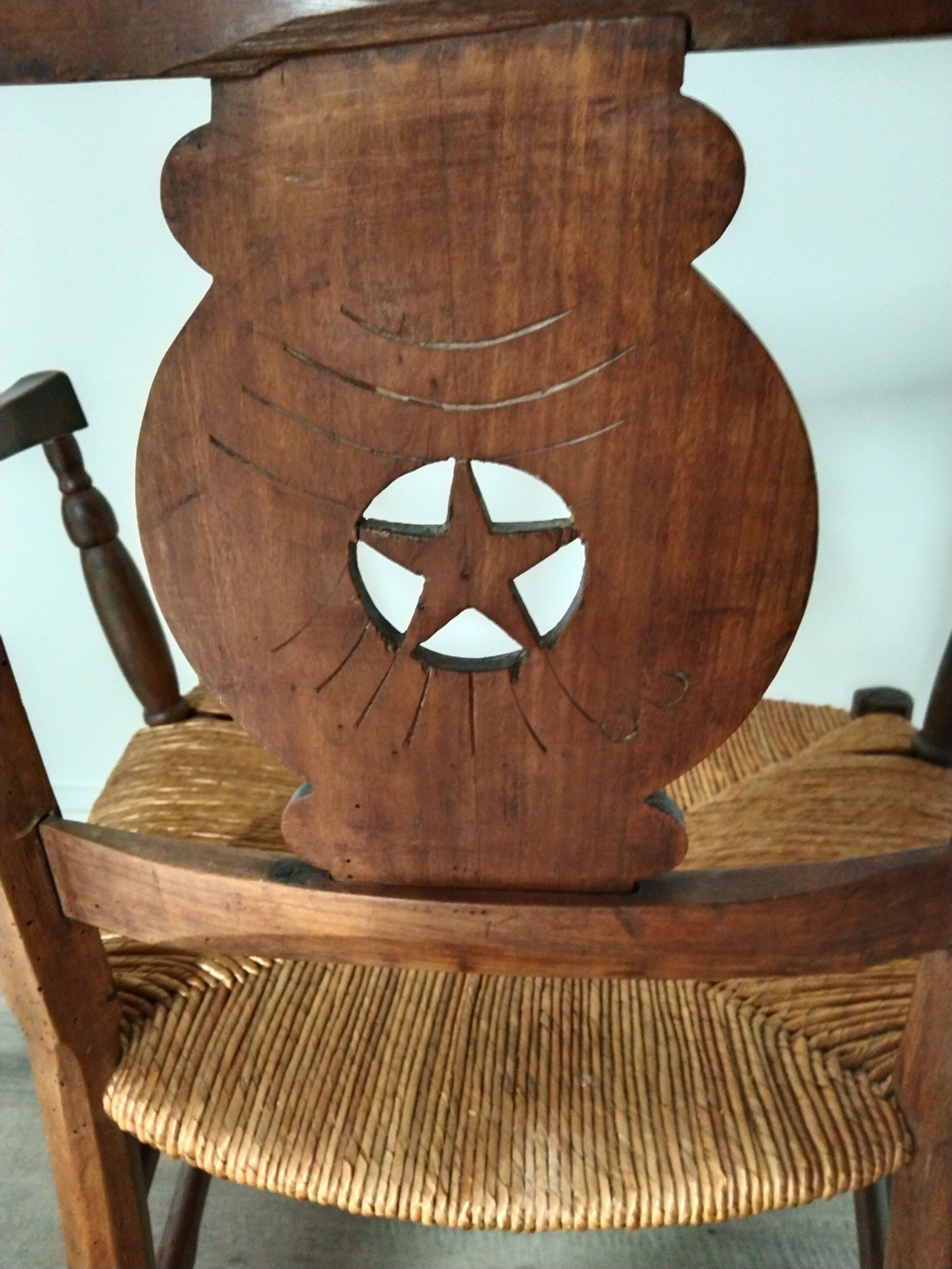 Straw armchair folk art.
